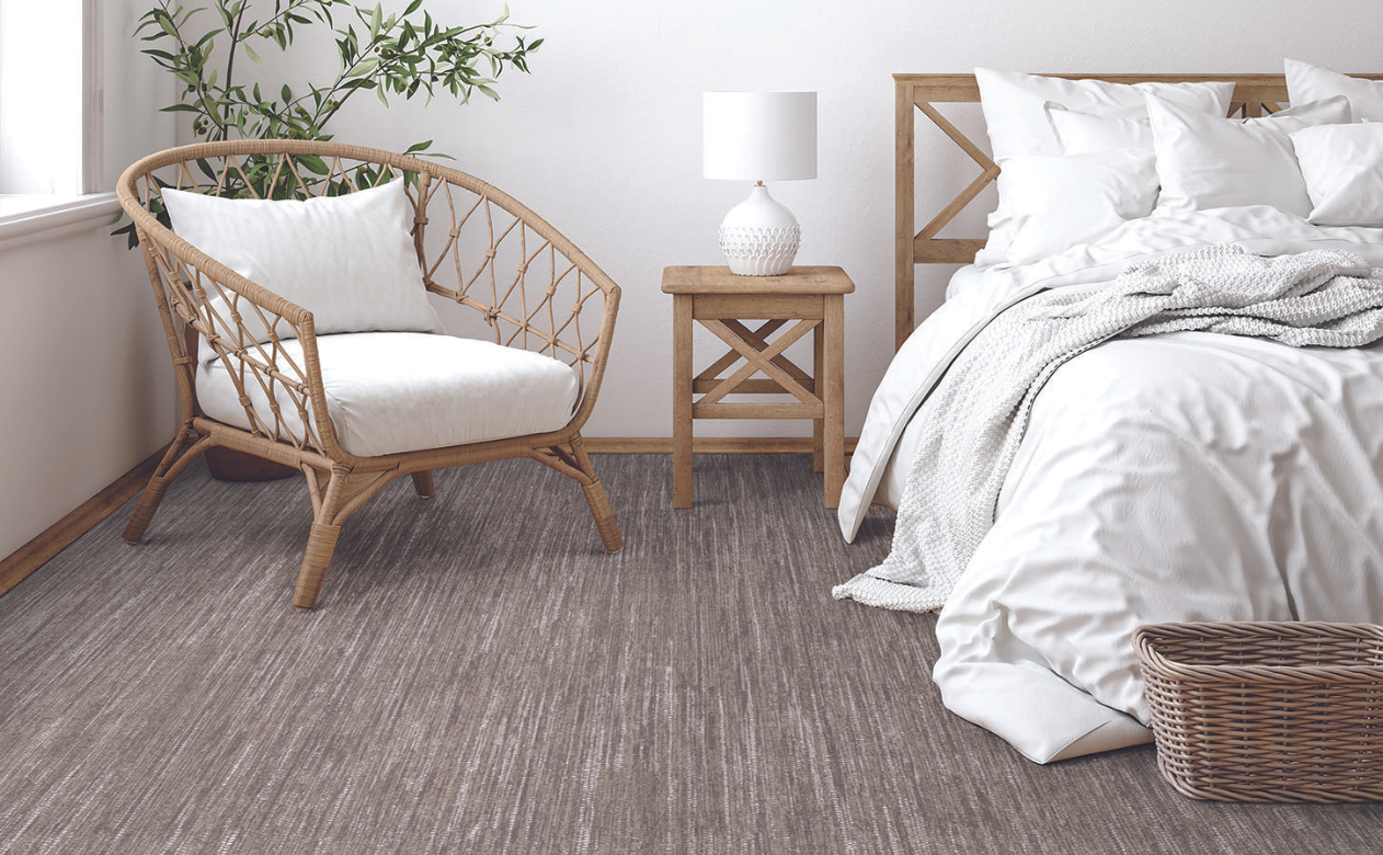 Berber carpet with wicker bedroom furnishings. 